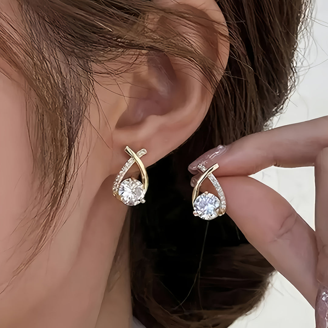 Pendientes con cruz de oro y circonitas
