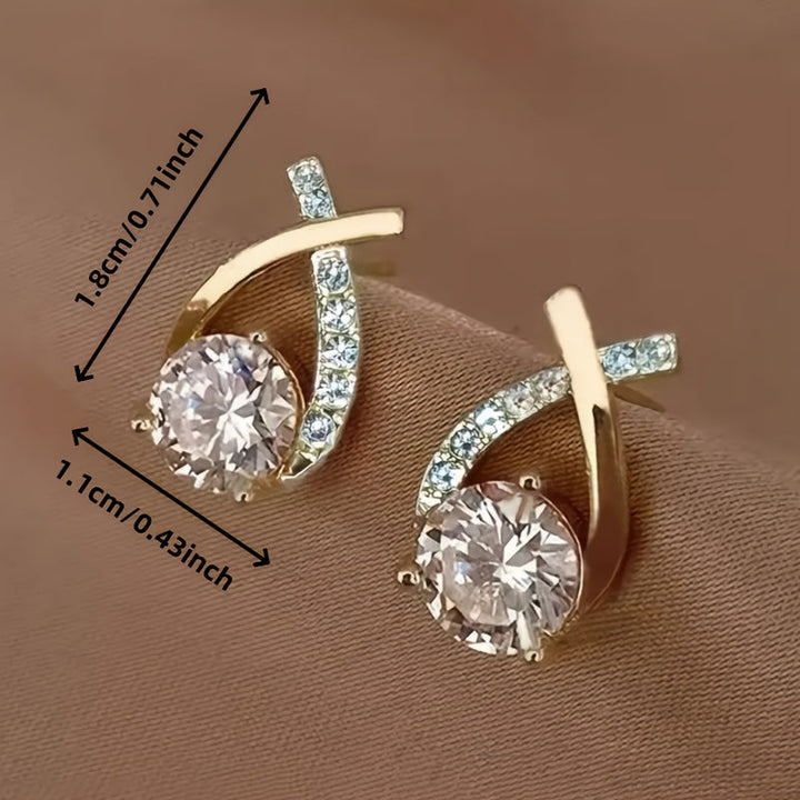 Pendientes con cruz de oro y circonitas
