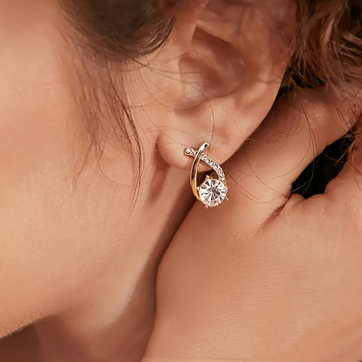 Pendientes con cruz de oro y circonitas