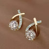 Pendientes con cruz de oro y circonitas